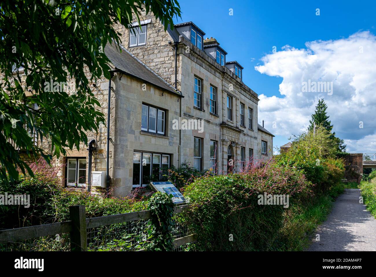 A view of the Georgian House known as Bridge House along the Stroudwater Canal at Ebley, Gloucestershire Stock Photo