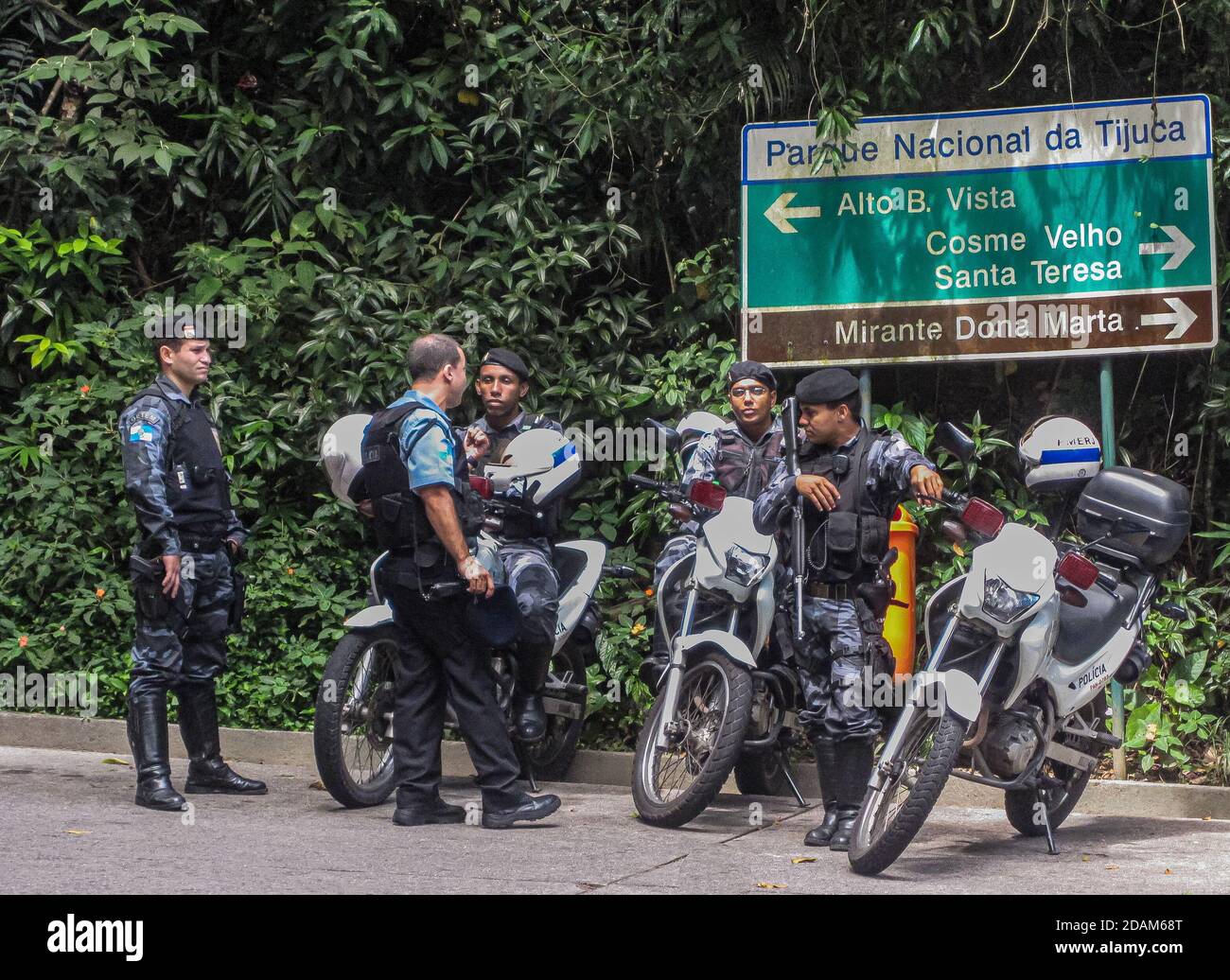 Rio de Janeiro, Brazil - December 2, 2008: Closeup of group of heavily armed police officers and their motorbikes parked on way to Christ the Redeemer Stock Photo