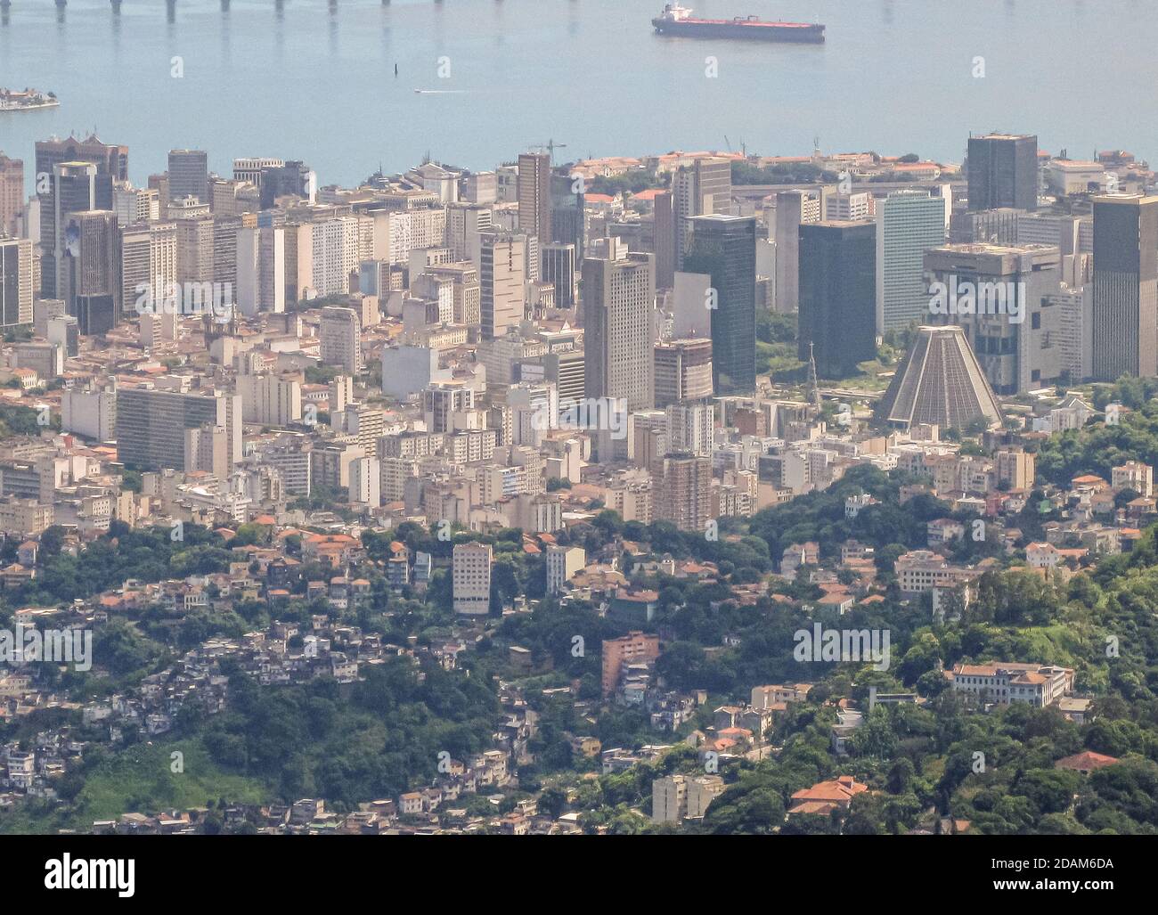 Rio de Janeiro, Brazil - December 24, 2008: Aerial view of Centro neighborhood with its high rise buildings and pyramidical Metropolitan Cathedral. Li Stock Photo