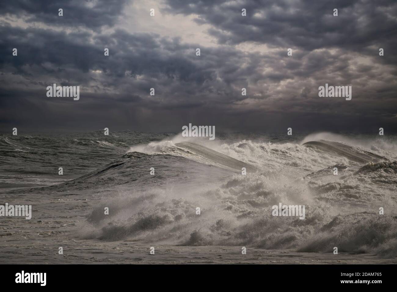 Stormy seascape with cloudy dark sky. Enhanced sky Stock Photo - Alamy