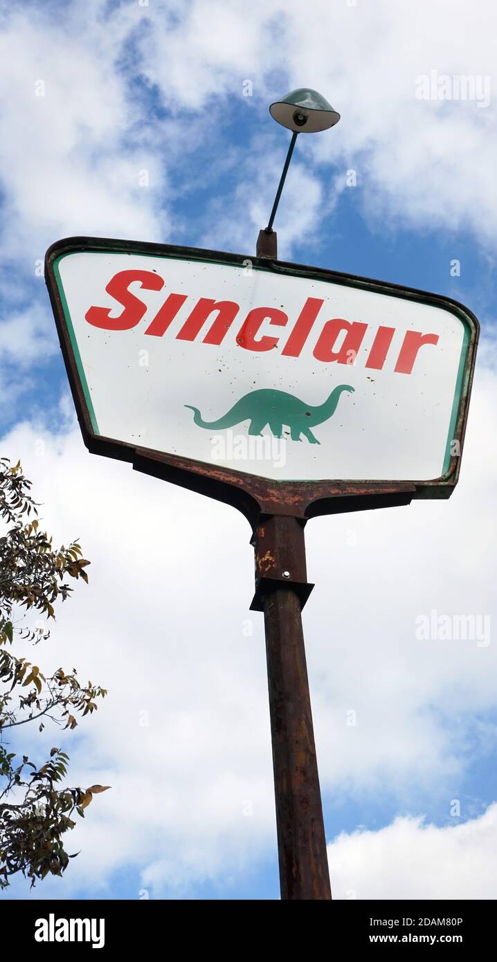 Fredericksburg,Texas - Nov. 12, 2020   Old Antique 1950's Sinclair Oil Corporation gas sign with dino the green   dinosaur logo. Stock Photo