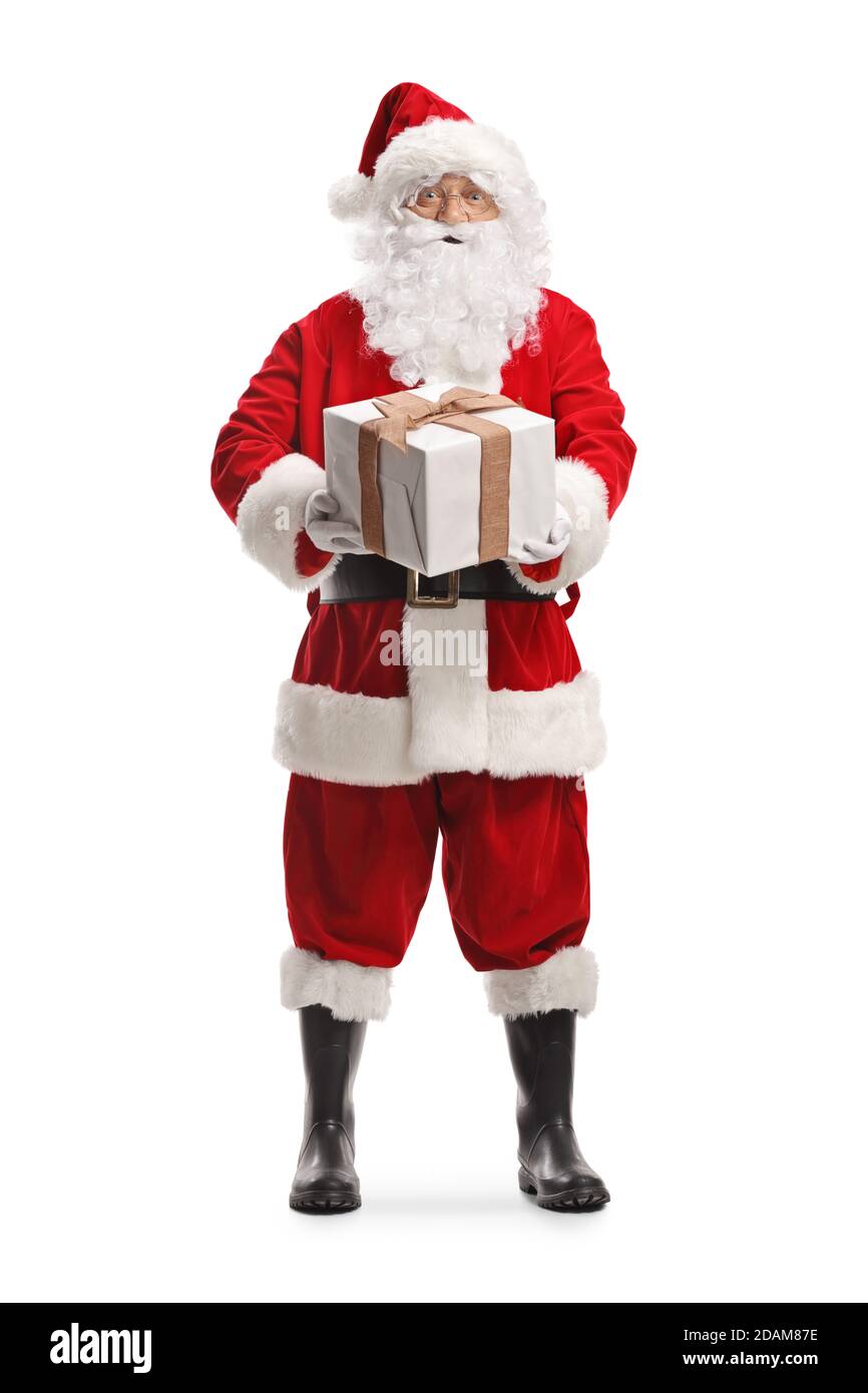 Full length portrait of Santa claus holding a big present box isolated ...