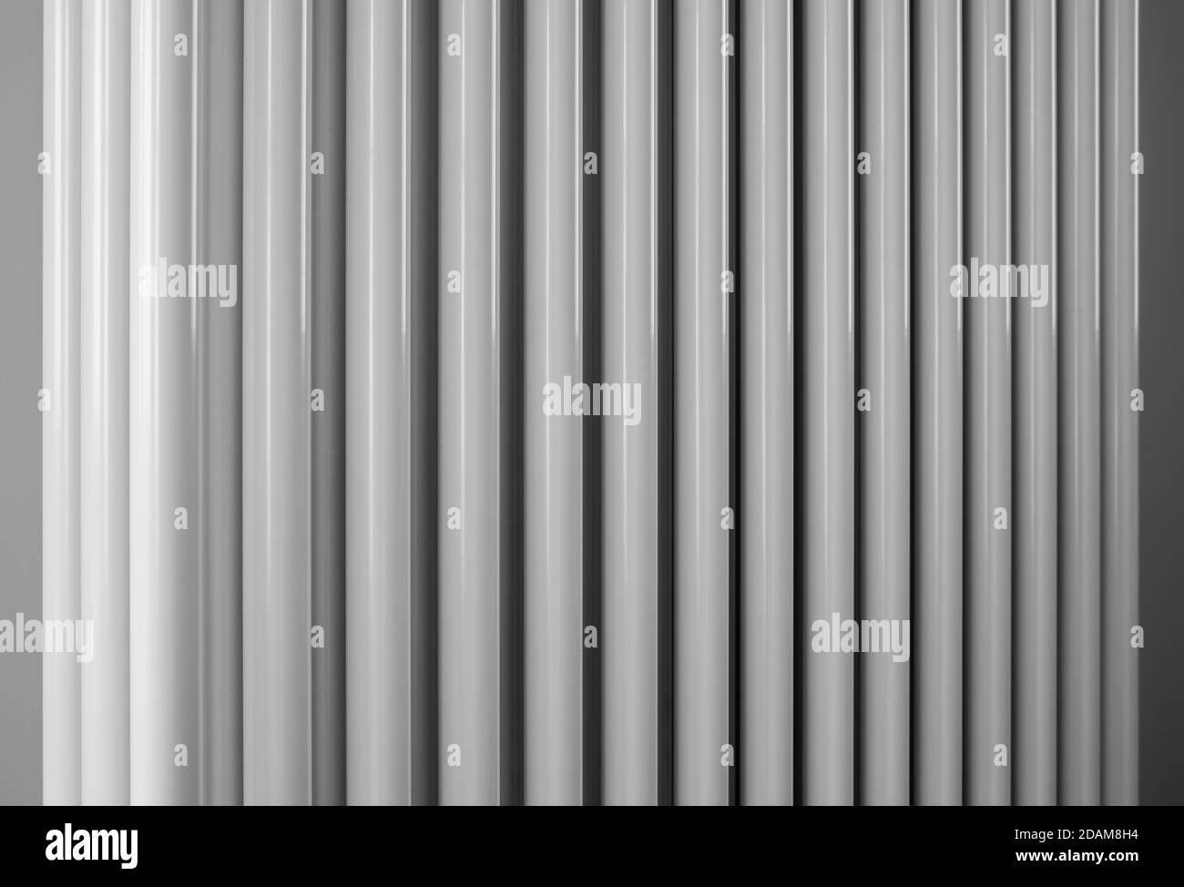 Black and white abstract image of a radiator pipes. Perspective Stock Photo