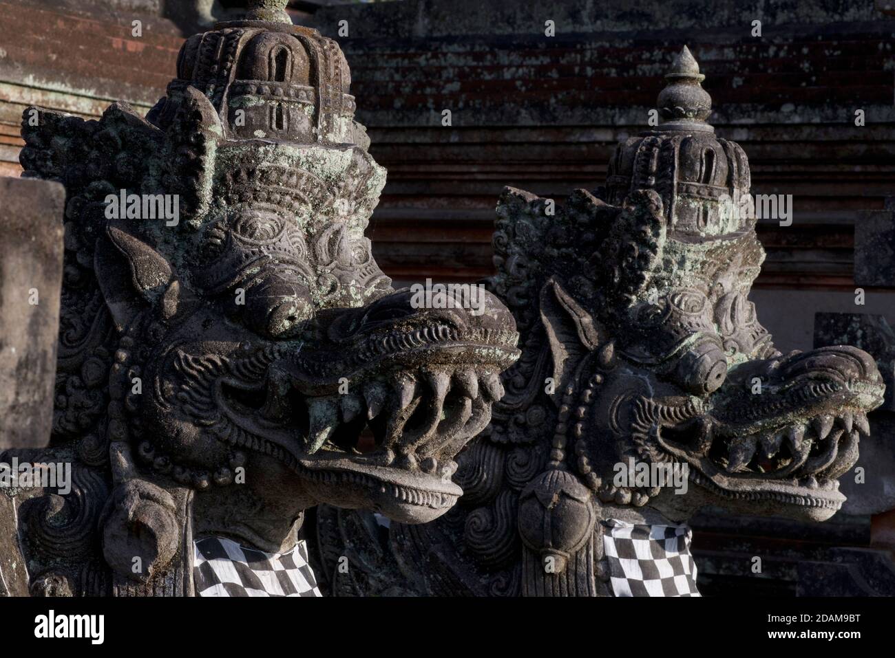 Stone carved Naga at the entrance to a temple, Bali, Indonesia. Naga