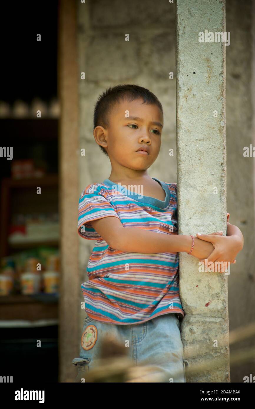 Candid portrait of a Balinese boy. Karangasem Regency, Bali, Indonesia Stock Photo