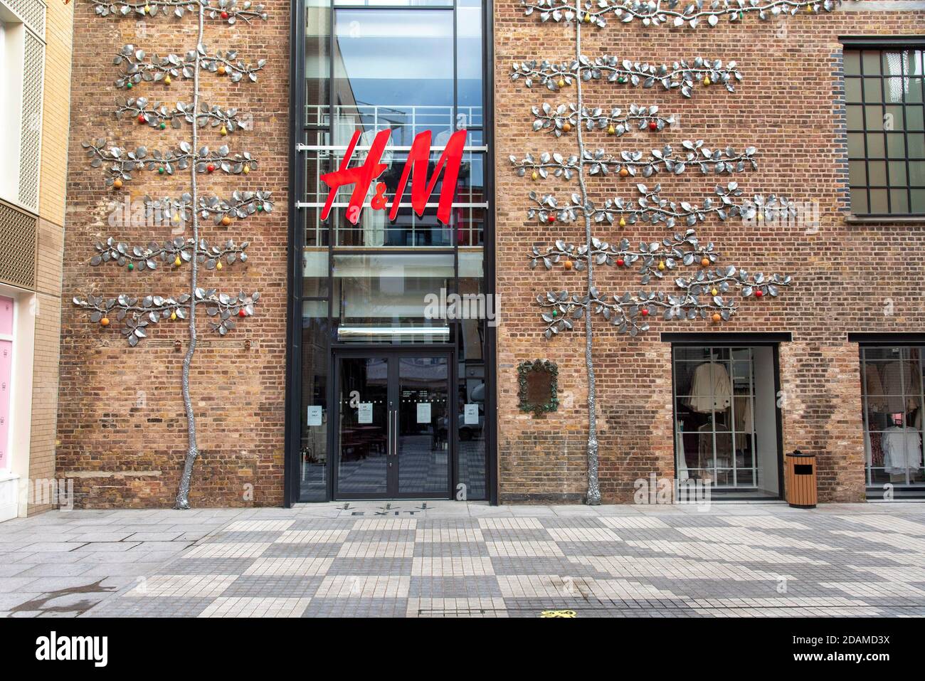 The H&M shop in London's Covent Garden with vines & leaves made of metal  seen outside Stock Photo - Alamy