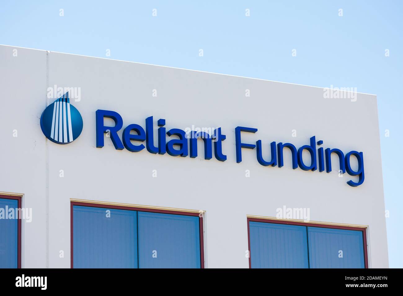 Reliant Funding sign logo on headquarters. Reliant Funding provides customized, short-term working capital to small and mid-sized businesses nationwid Stock Photo