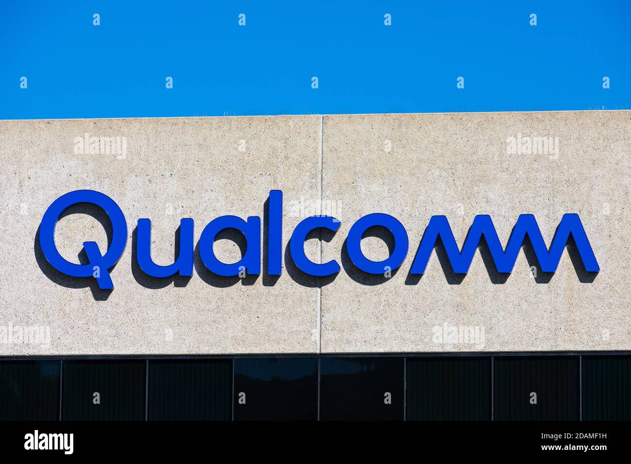 Qualcomm logo sign on headquarters building. Qualcomm Incorporated is an American multinational semiconductor and telecommunications equipment company Stock Photo