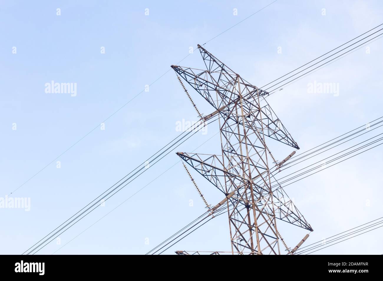 high voltage poles in blue sky with cloud Stock Photo - Alamy