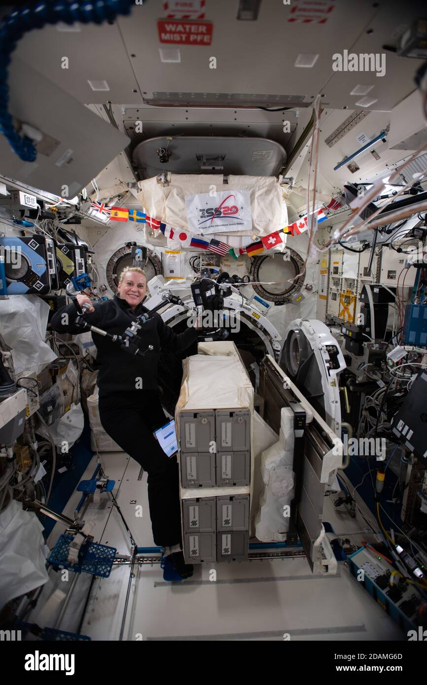 ISS - 02 November 2020 - NASA astronaut and Expedition 64 Flight Engineer Rubins works in Japan's Kibo laboratory module to set up a small satellite d Stock Photo
