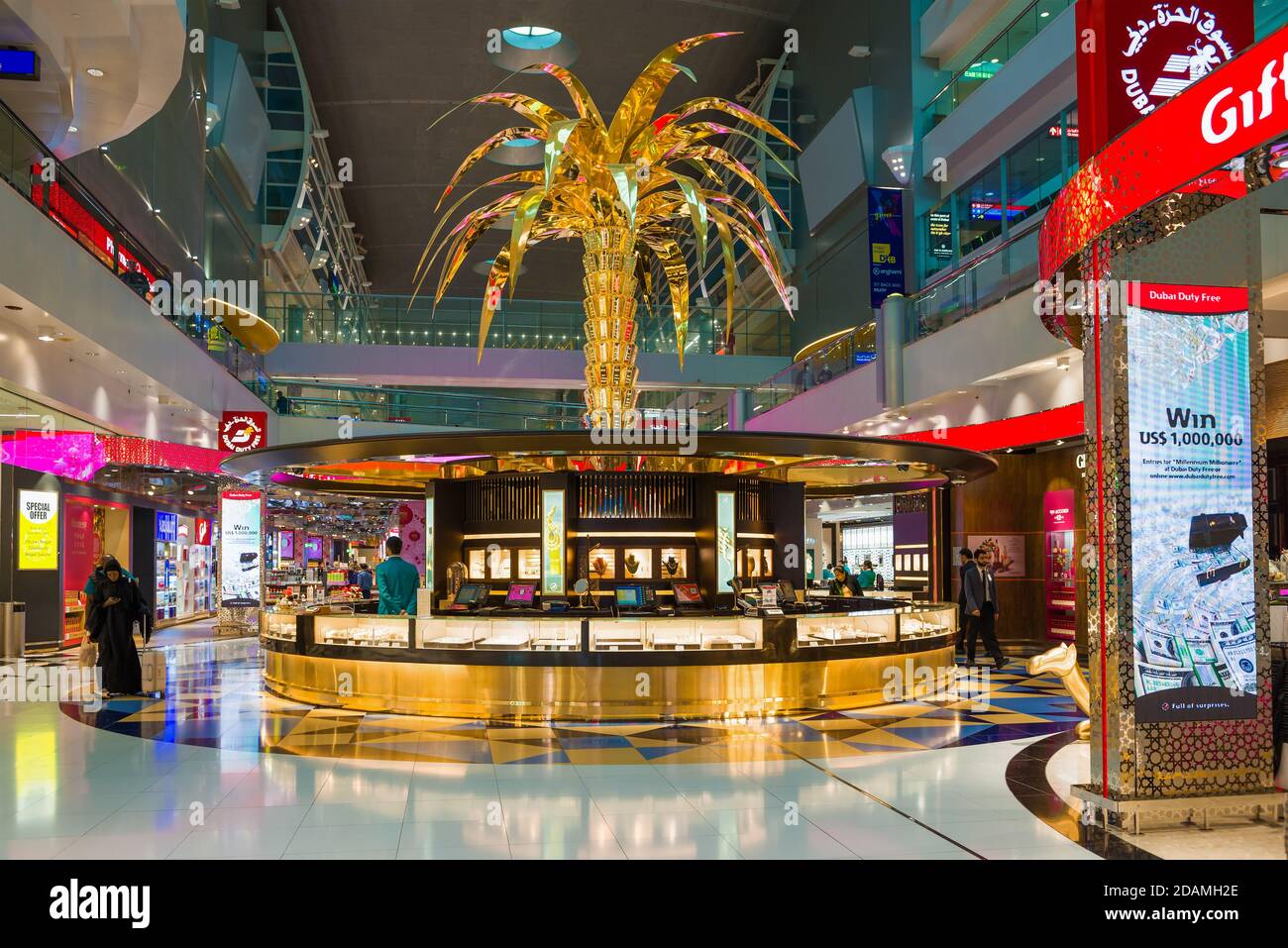 DUBAI, UAE - FEBRUARY 02, 2020: Golden Palm tree above the jewelry section of the Duty Free store in the transit area of Dubai Airport Stock Photo