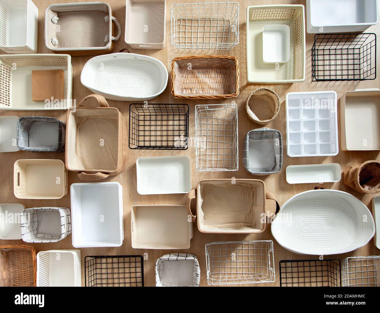 Top view of closet organization boxes and steel wire baskets in different  shapes Stock Photo - Alamy