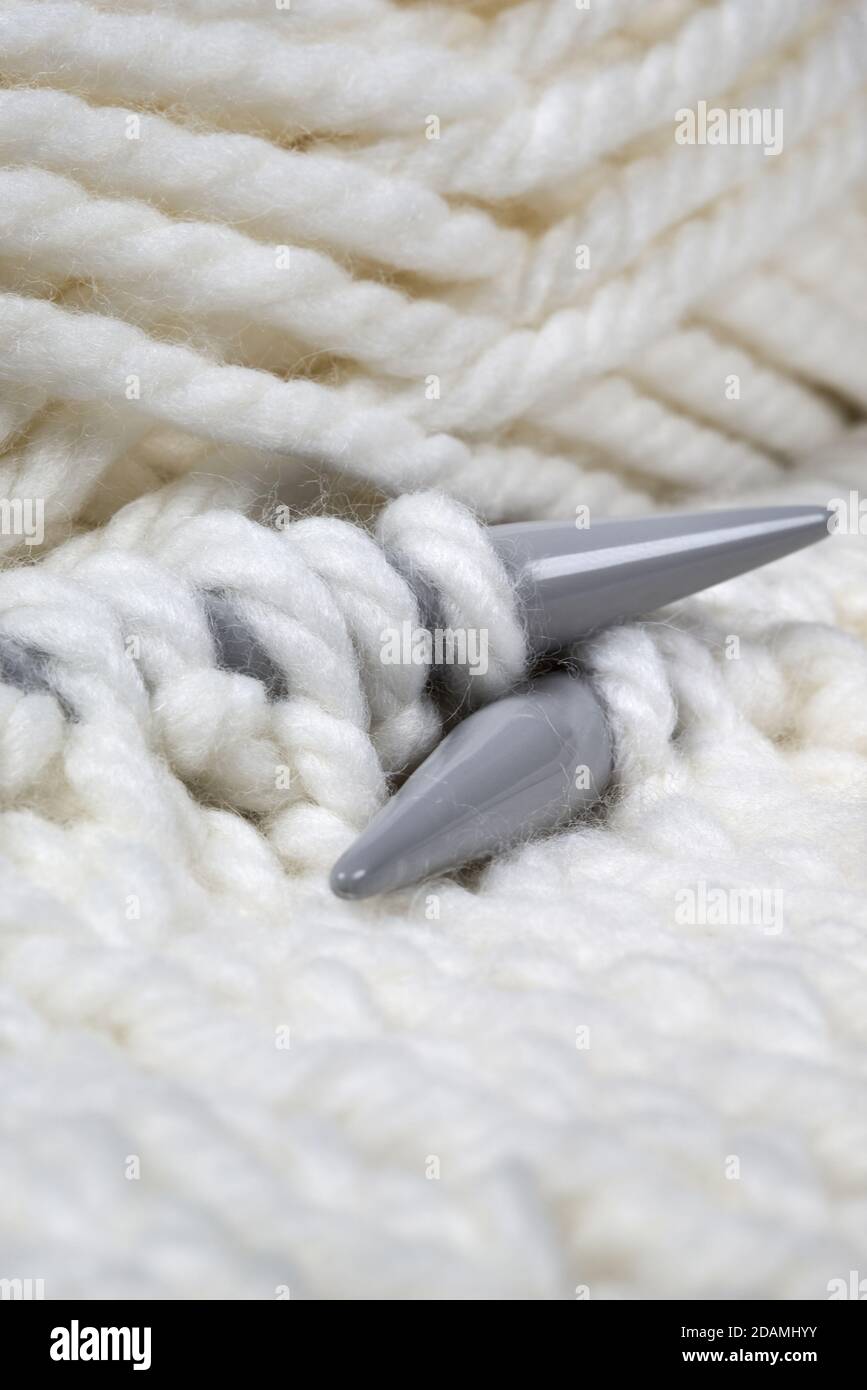 white wool knitted with spokes Stock Photo
