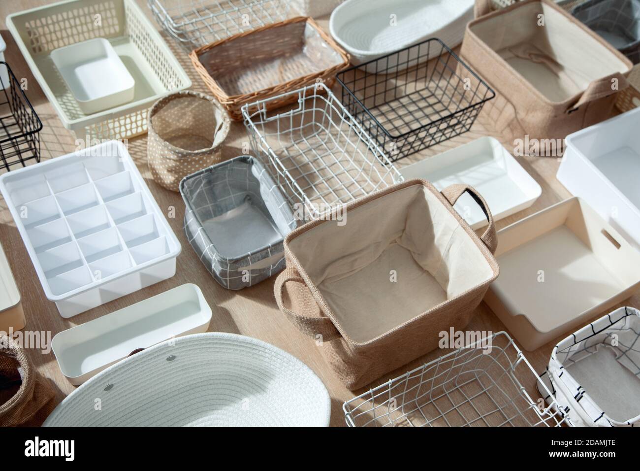 Top view of closet organization boxes and steel wire baskets in different  shapes Stock Photo - Alamy