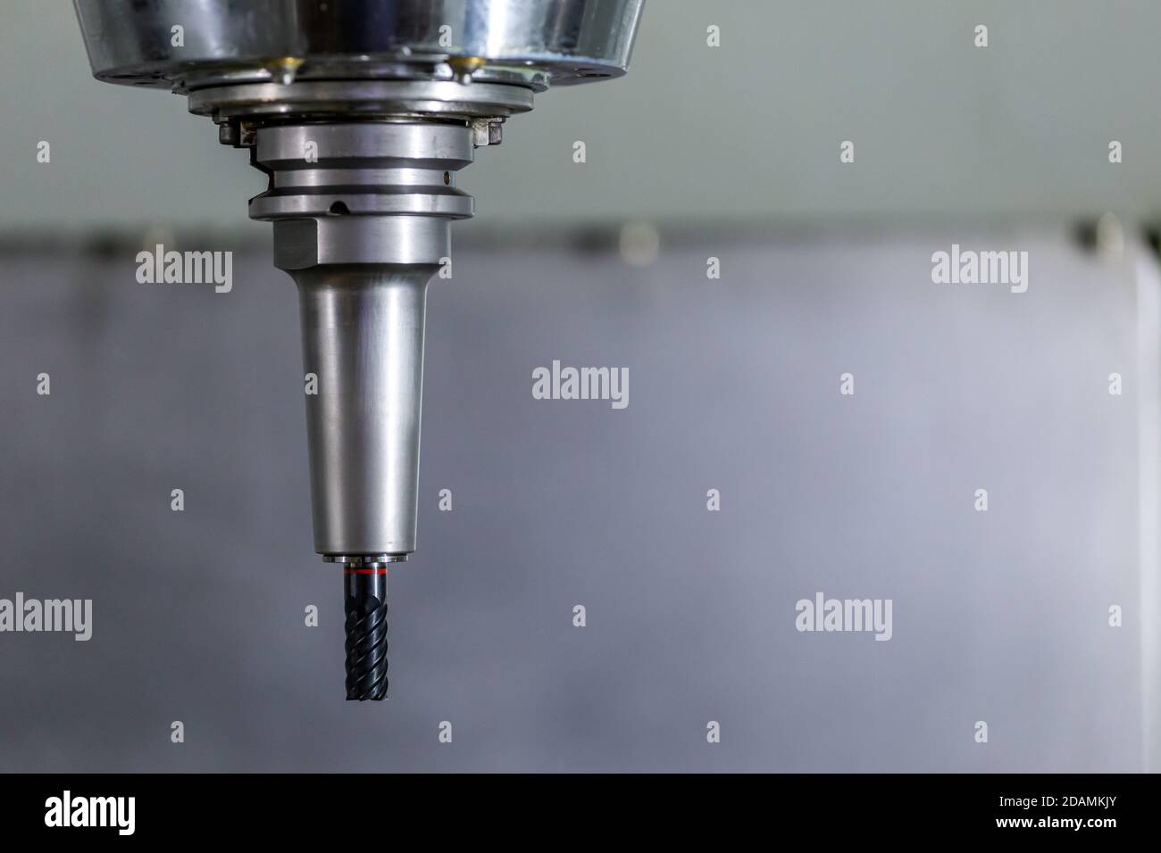 carbide mill in slim hydraulic chuck in vertical cnc milling machine