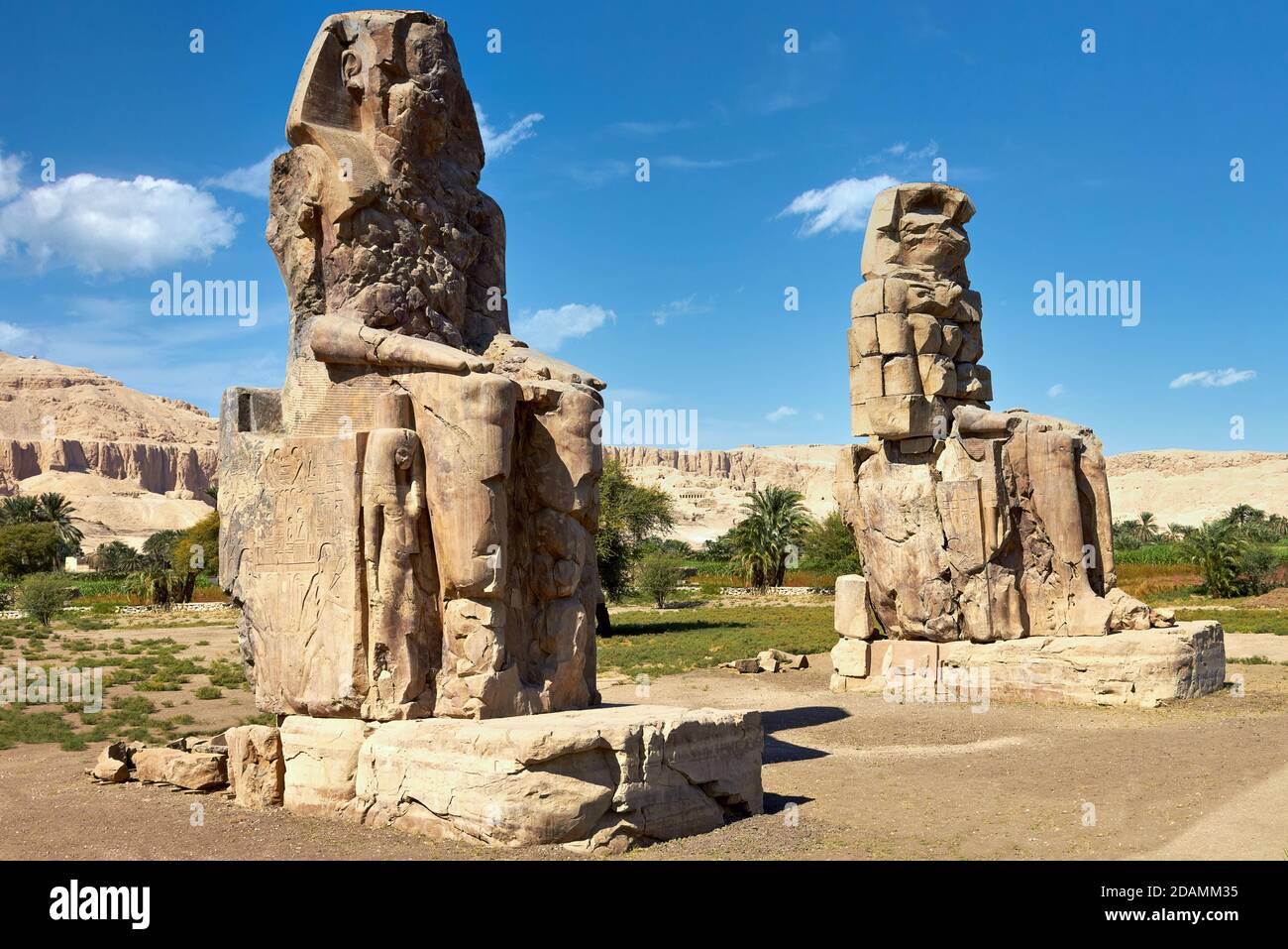 Giant stone statues of Pharaoh Amenhotep III near the Valley of the Kings, Luxor, Egypt Stock Photo