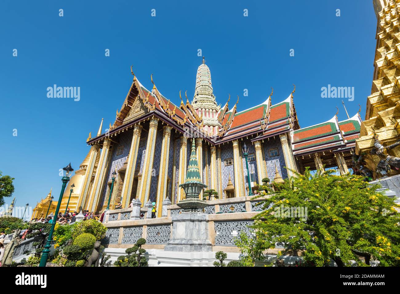 Bangkok, Thailand - December 7, 2019: The Temple of the Emerald Buddha landmark in Bangkok - one of the most popular tourists destination in Thailand. Stock Photo