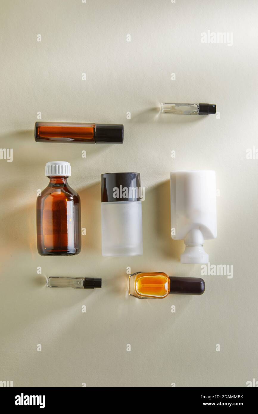 Variety of blanks for hand cream, perfumery, shower gel, bottles without labels on a white background with shadows. Flat lay Stock Photo