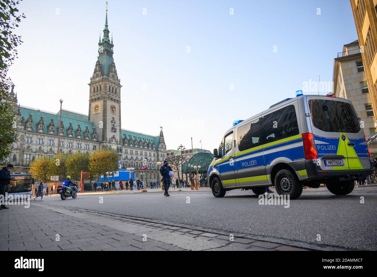 Hamburg, Germany. 08th Nov, 2020. A team car of the police is driving on Mönckebergstraße towards the Hamburg City Hall and the Rathausmarkt. Credit: Jonas Walzberg/dpa/Alamy Live News Stock Photo