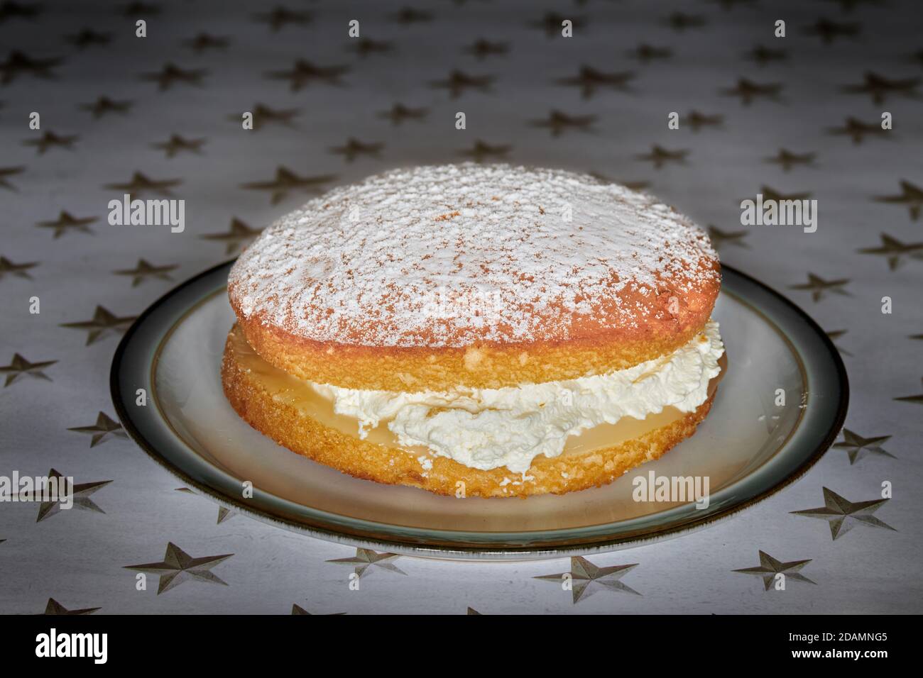 Whole lemon cream sponge cake. Stock Photo