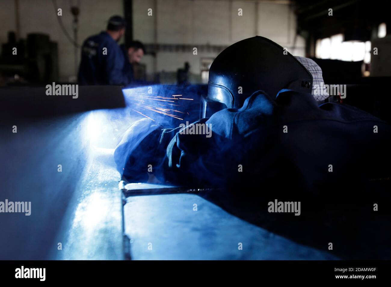 Factory workers in Bosnian factory Stock Photo