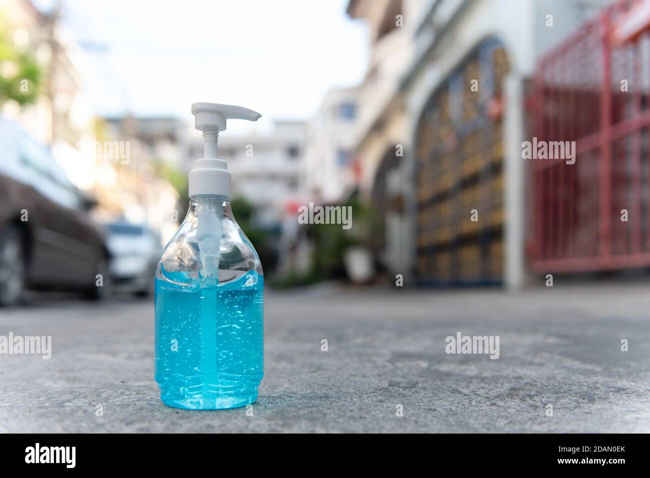 Ethyl Alcohol, hand gel placed on the street in front of the house, concept for coronavirus, covid19 Stock Photo