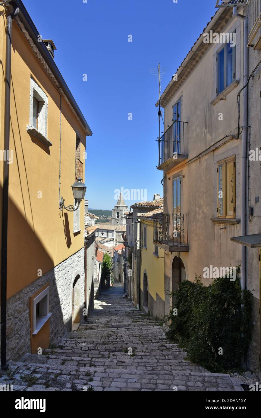 A narrow street among the old houses of Riccia, a medieval village in the Molise region, Italy. Stock Photo