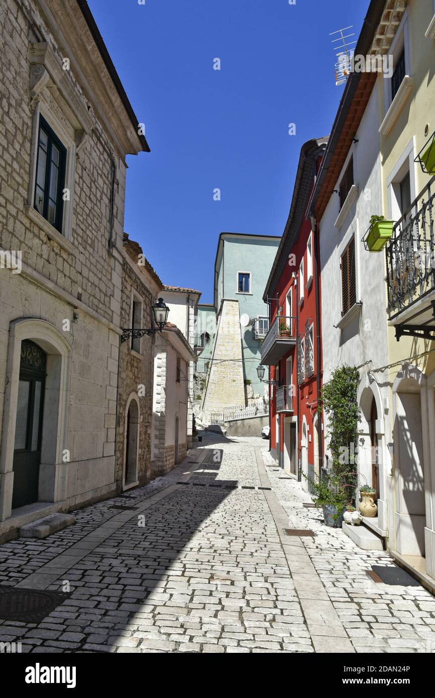 A narrow street among the old houses of Riccia, a medieval village in the Molise region, Italy. Stock Photo