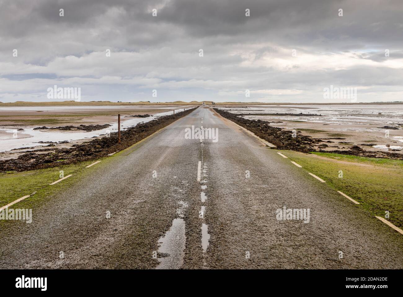 Lindisfarne Causeway  from the mainland to Holy Island. Stock Photo