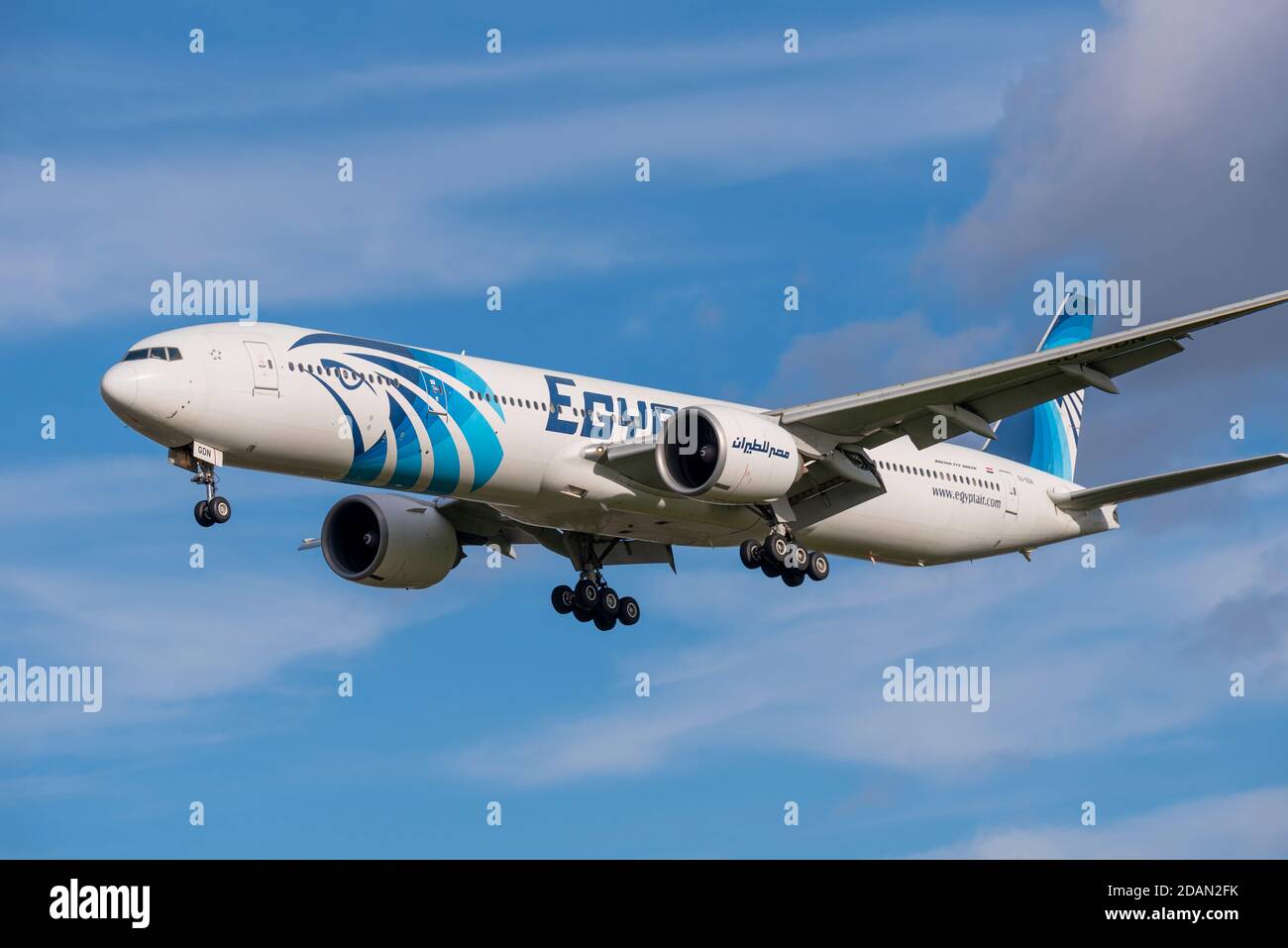 EgyptAir Boeing 777 jet airliner plane SU-GDN on approach to land at London Heathrow Airport, UK, during COVID 19 lockdown. Horus sky deity livery Stock Photo