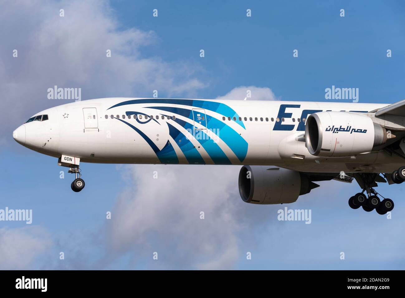EgyptAir Boeing 777 jet airliner plane SU-GDN on approach to land at London Heathrow Airport, UK, during COVID 19 lockdown. Horus sky deity livery Stock Photo