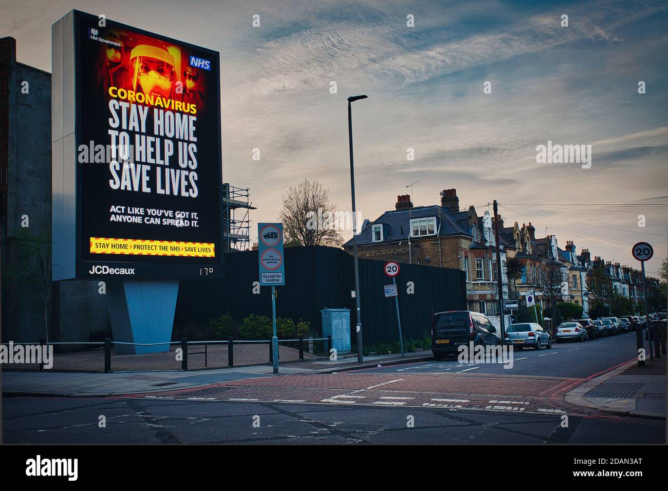 GREAT BRITAIN / England / London / HM Government, and NHS advertising boards advice to stay at home and help save lives . Stock Photo