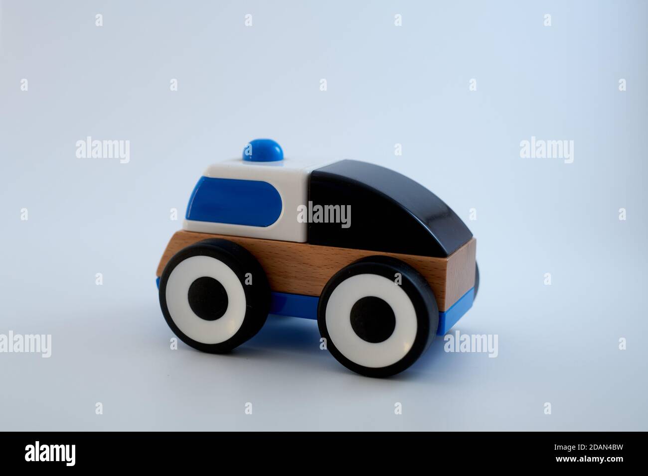 Wooden toy ambulance car. Isolated on white background Stock Photo - Alamy