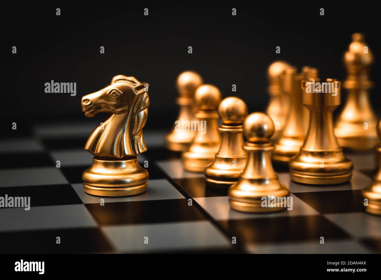 Chess horse piece gold color represent successful business company executive boss team leader