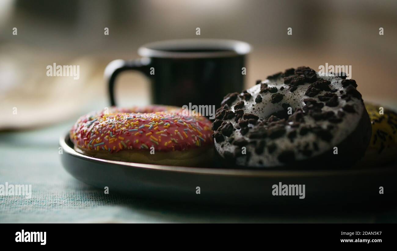 View of assortment colorful frosted delicious tasty glazed sprinkled ...