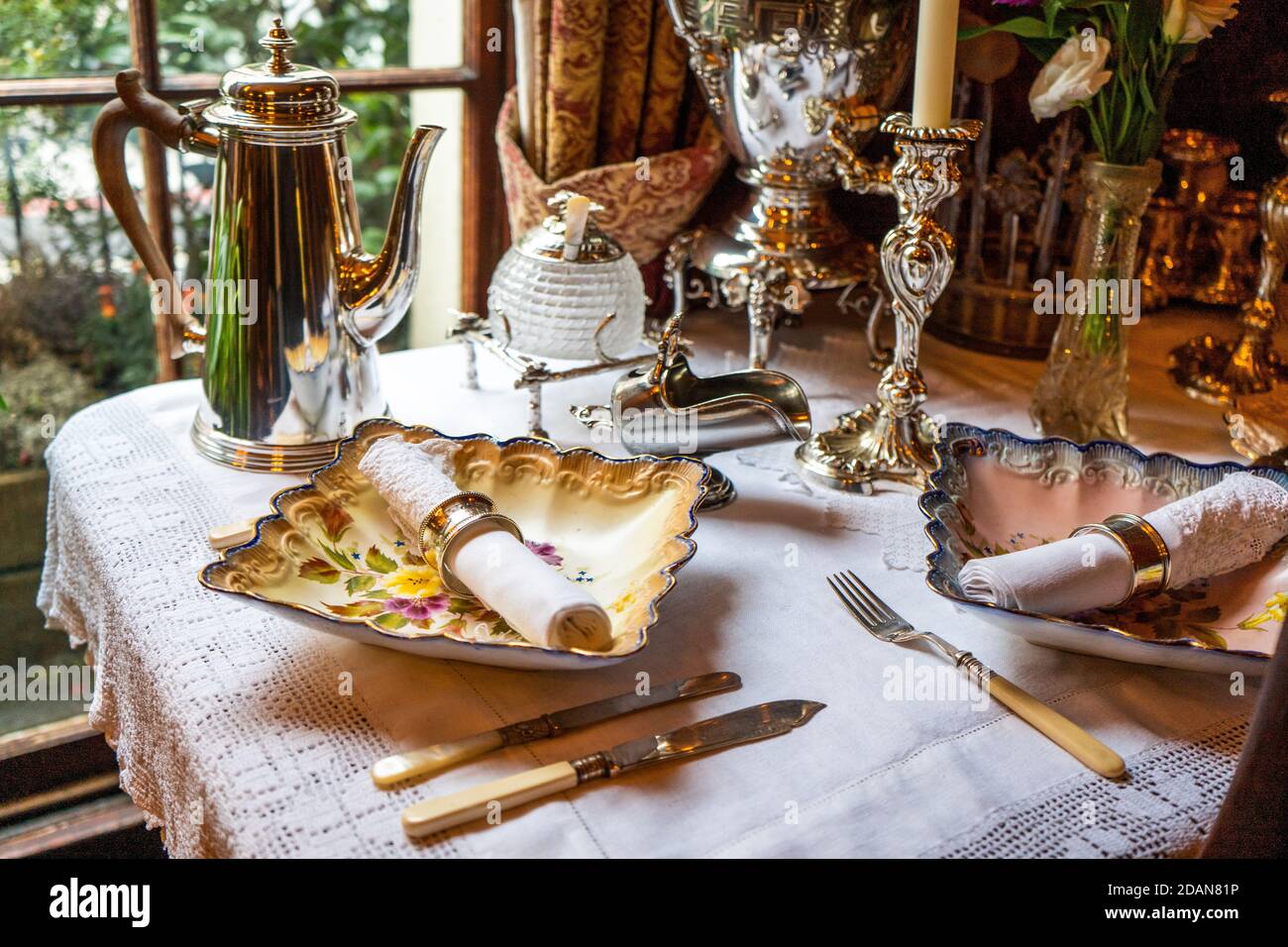 Set table with antique dishes Stock Photo