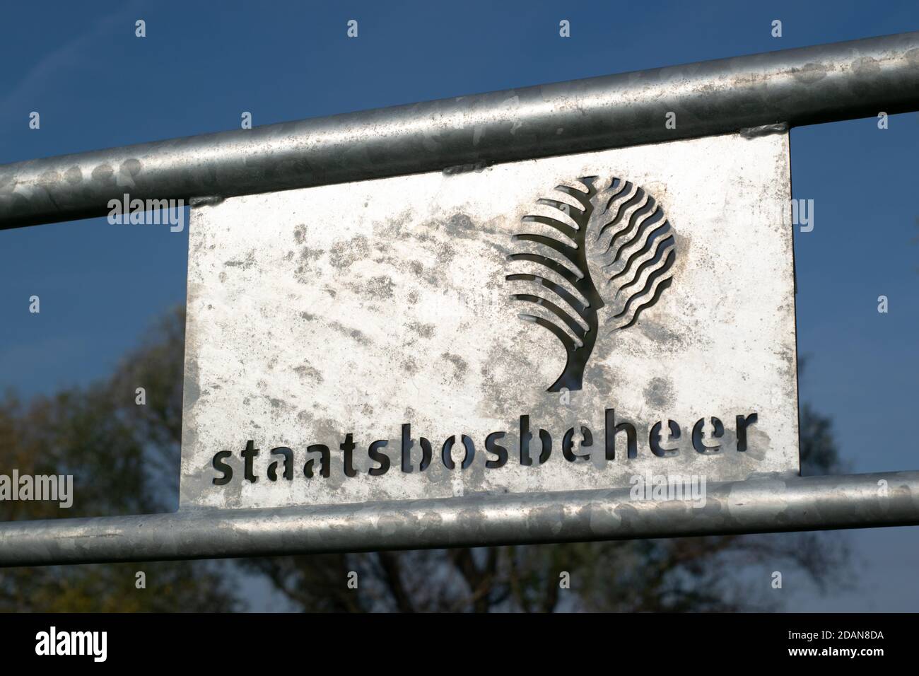 A Metal staatsbosbeheer sign standing in the Nature Stock Photo