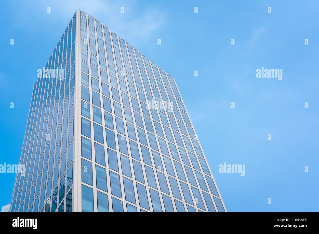 Modern skyscraper blue sky Stock Photo - Alamy