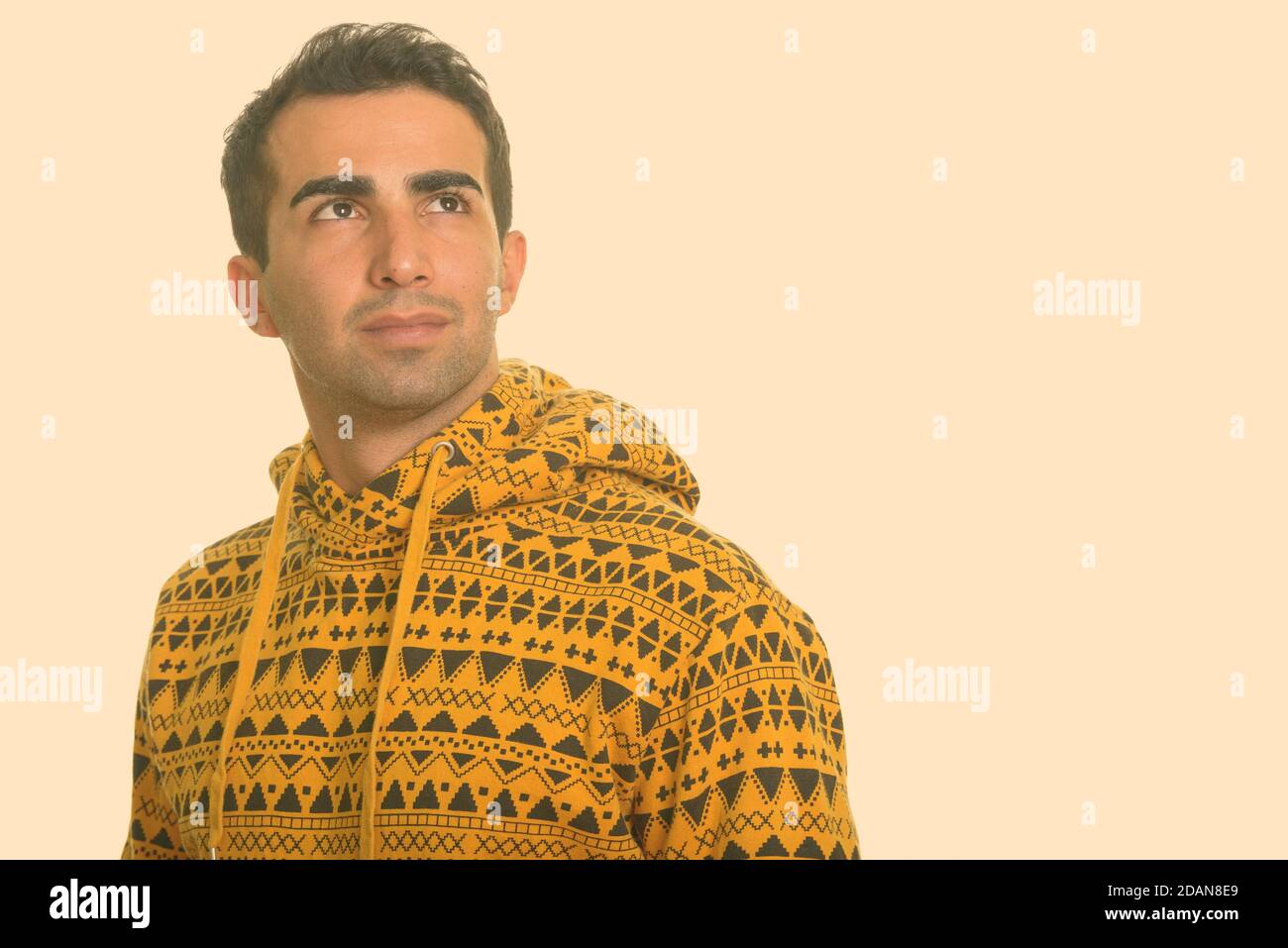 Young handsome Iranian man thinking Stock Photo - Alamy
