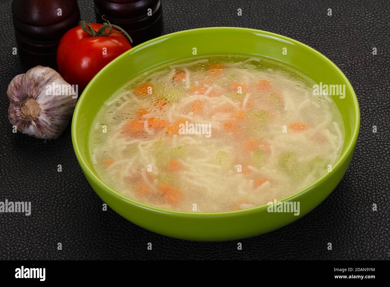 Chicken soup with noodles, carrot and celery Stock Photo Alamy