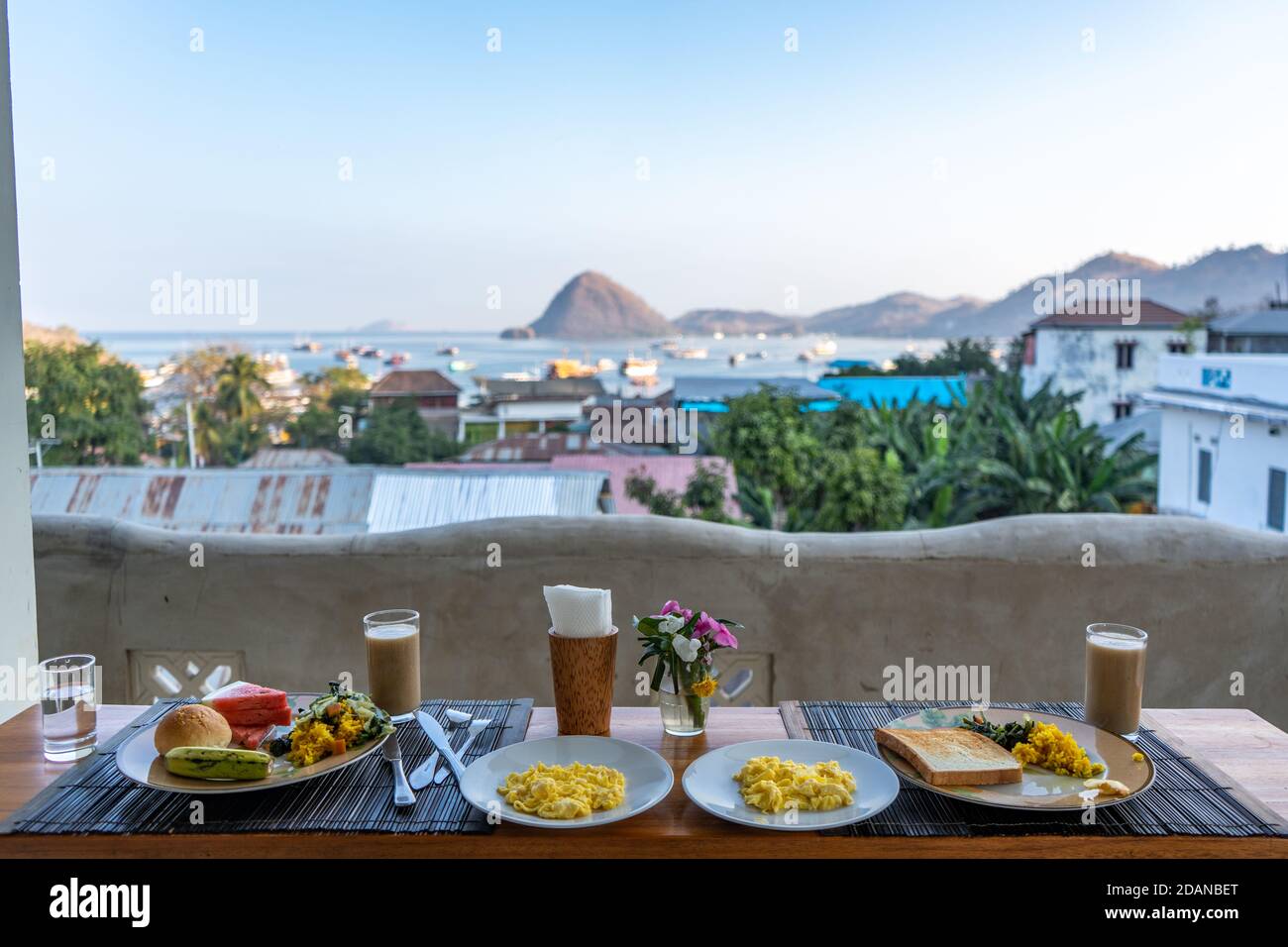 breakfast served in a restaurant with view on sea and mountains Stock Photo