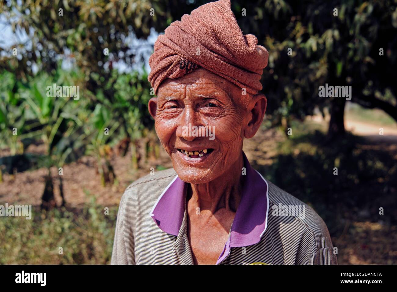 Portrait of an old tourist guide and horse and cart driver at the ancient capital of Inwa Myanmar Stock Photo
