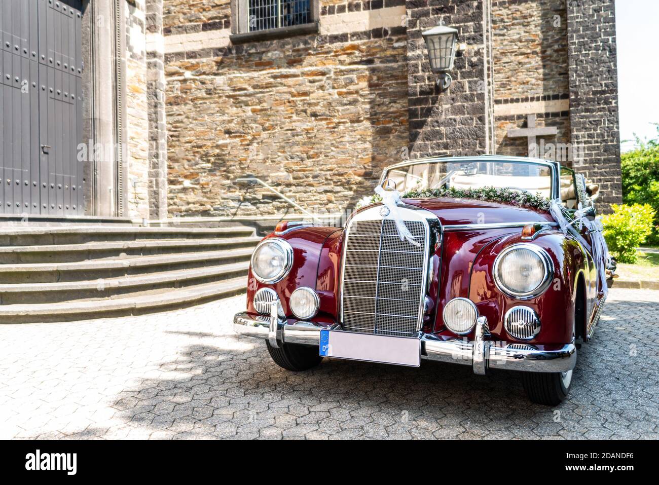 Ochtendung Germany 25.05.2019 Mercedes-Benz Typ 300 Adenauer W186 Cabriolet luxury executive classic German 1950s car decorated for a wedding with flo Stock Photo