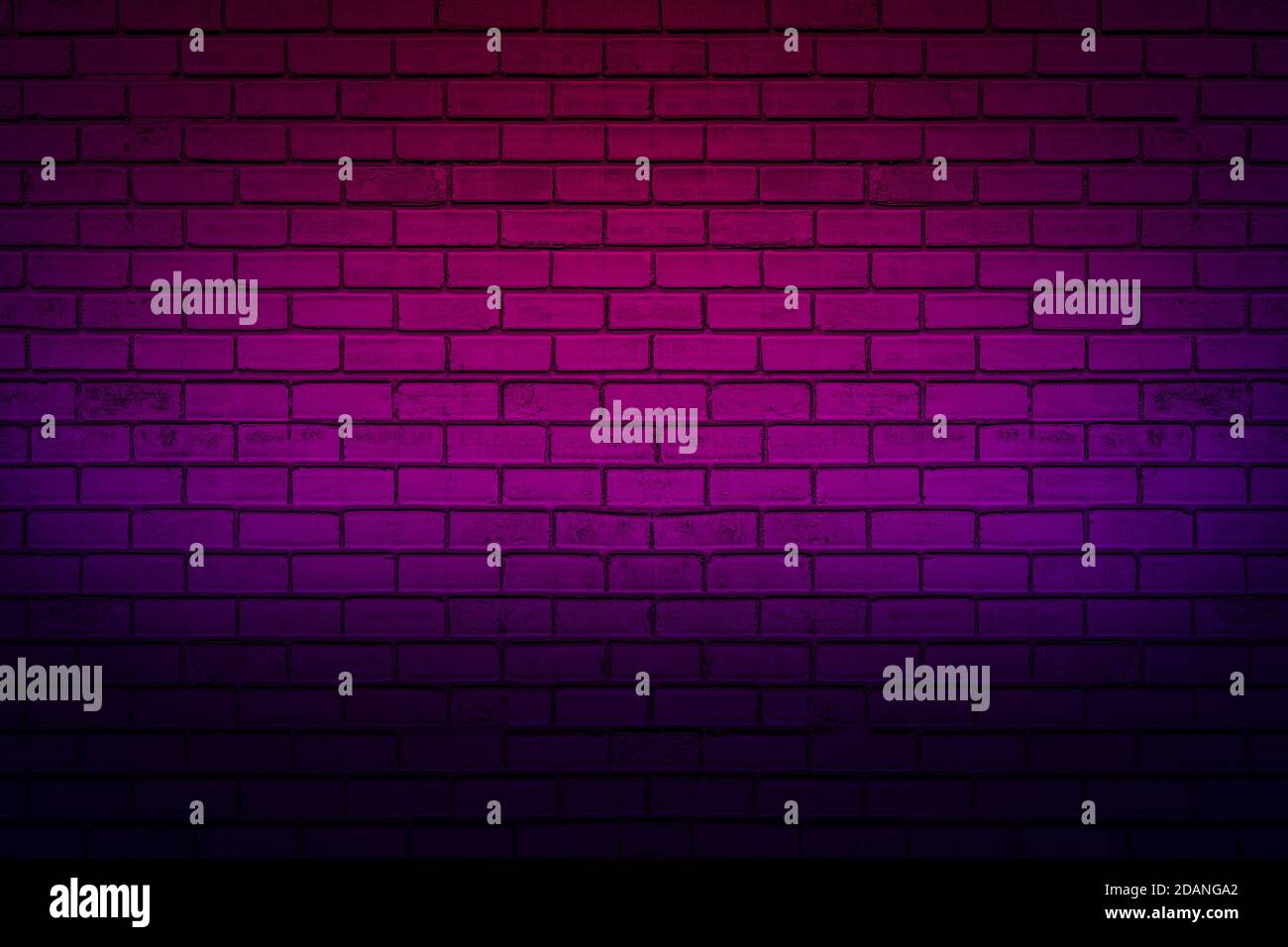 Lighting effect neon light on brick wall texture for background. Stock Photo