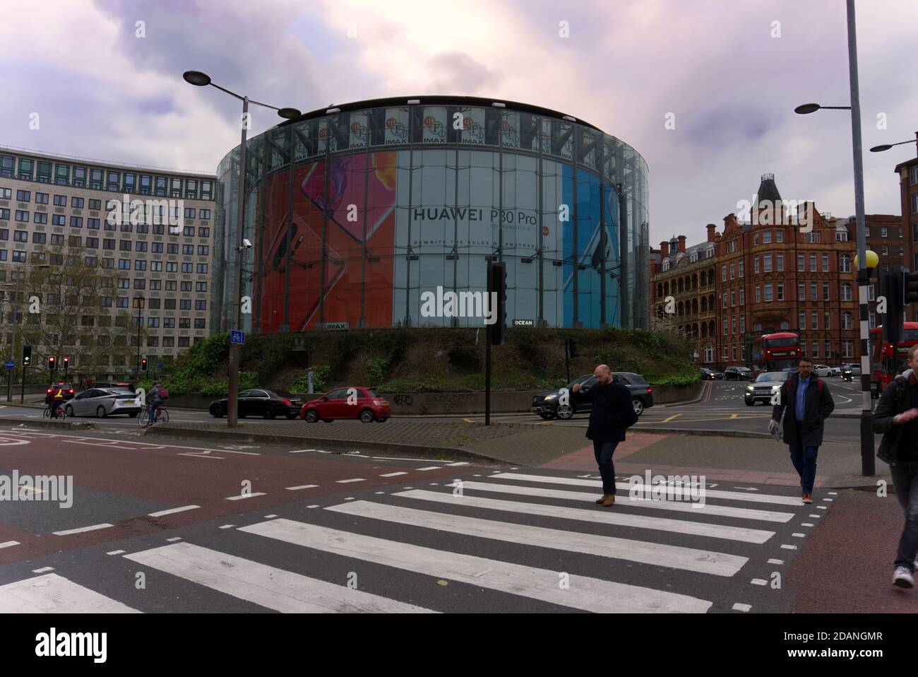 Waterloo, London, United Kingdom - April 12, 2019: IMAX theatre viewed across road and crossing with some motion blurring Stock Photo