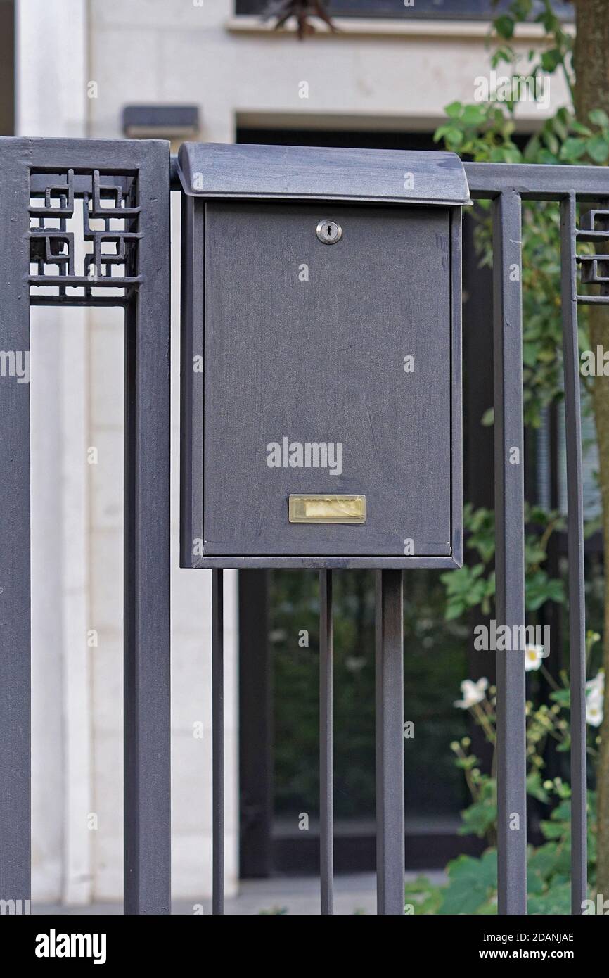 Grey metal post box for sale