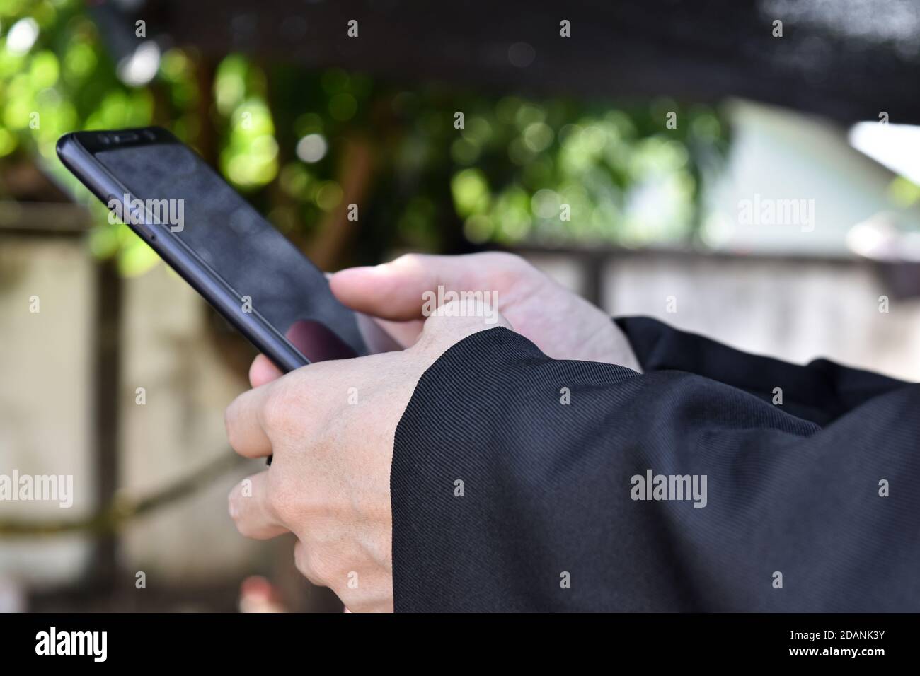 Close up of man using smartphone. selective focus Stock Photo