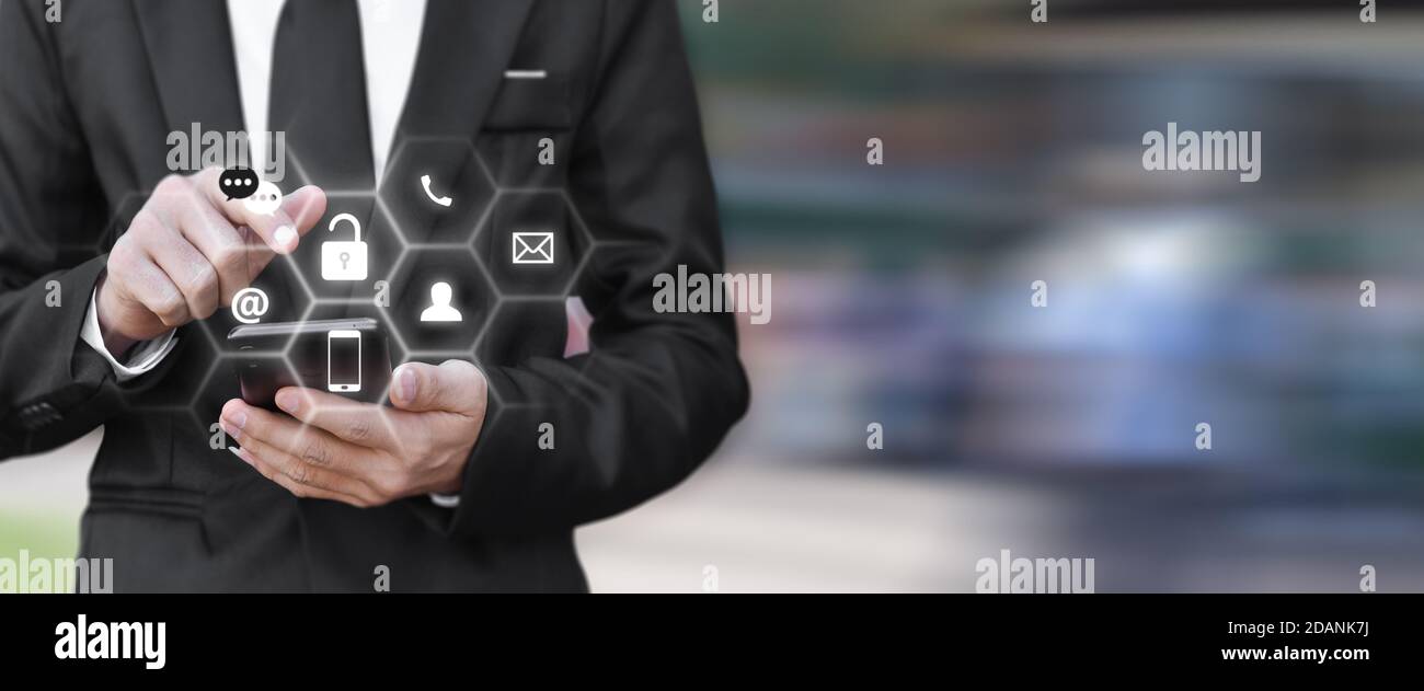 Closeup image of businessman pressing unlock icon on mobile phone with copy space. Idea for connection social media in smartphone. Stock Photo
