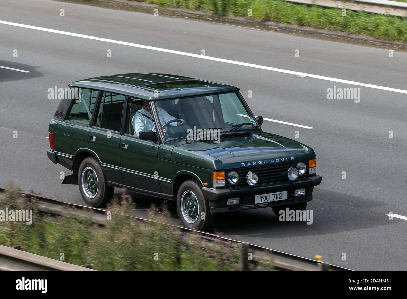 1993 90s green Land Rover Range rover Vogue Se Car 4 speed automatic Hardtop Petrol driving on the M6 motorway near Preston in Lancashire, UK. Stock Photo