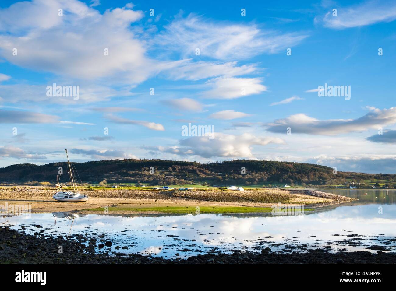 Incoming tide in harbour at Red Wharf Bay, Isle of Anglesey, Wales, UK, Britain Stock Photo